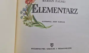 Ilustrowany elementarz z lat 60. Mariana Falskiego, z motywem motyla i kwiatów.