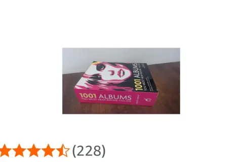 Książka "1001 albumów muzycznych, które musisz usłyszeć przed śmiercią" z okładką przedstawiającą twarz kobiety.