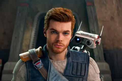 Cameron Monaghan jako Cal Kestis z droidem BD-1. Jego filmy, seriale i programy to przygody w świecie Gwiezdnych Wojen.