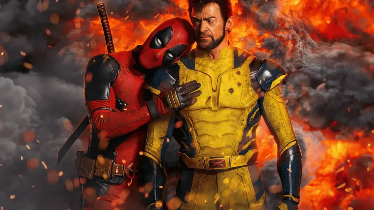 Deadpool przytula się do Wolverine'a na tle płomieni. Zapowiedź premiery Deadpool 3.